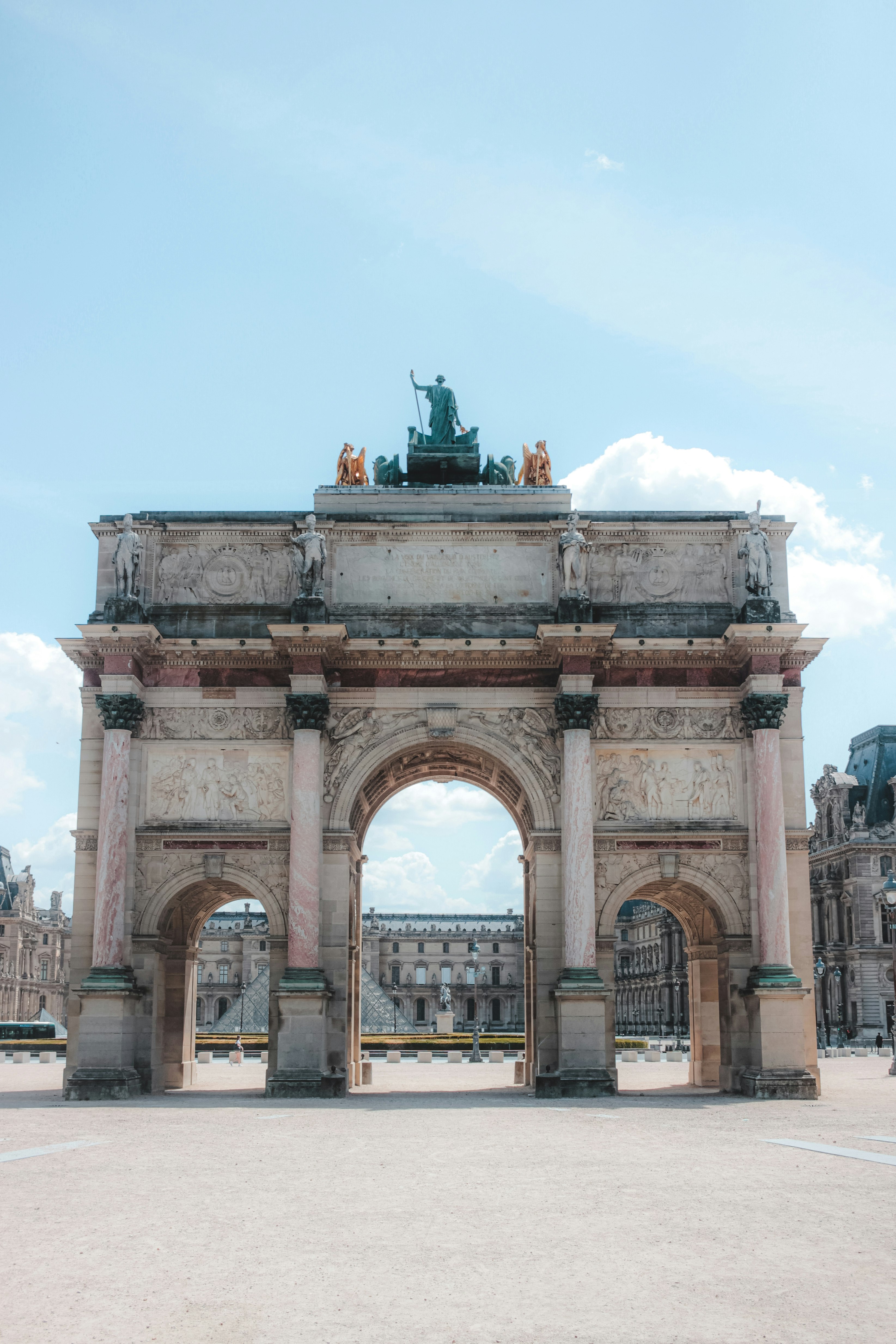 brown concrete arch under blue sky during daytime